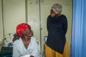 Habiba interacts with a fistula patient.