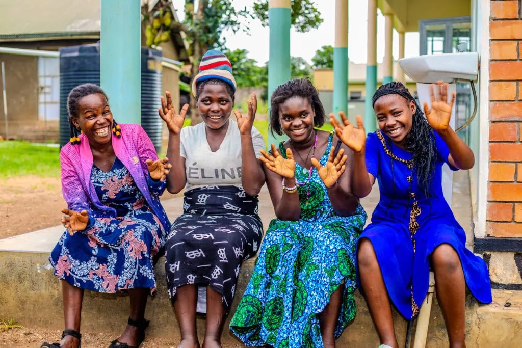 A group of fistula survivors from Uganda celebrate their health and happy futures.